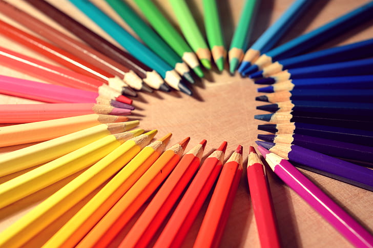 multicolored color pen in heart formation
