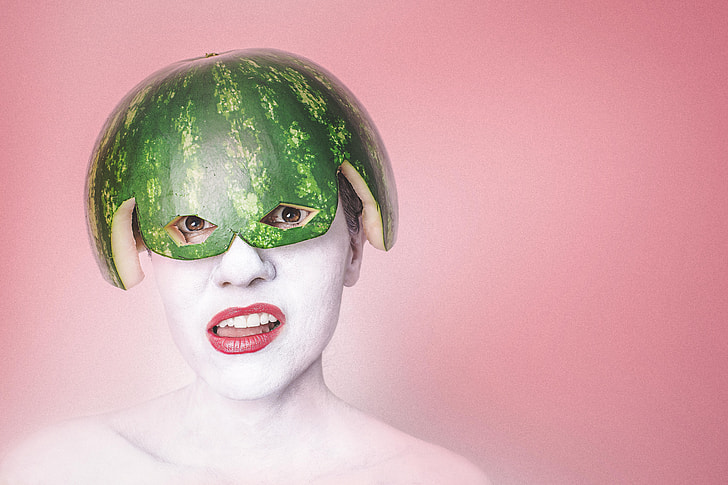 woman with watermelon on head