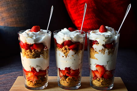 three set of strawberries with whip creams