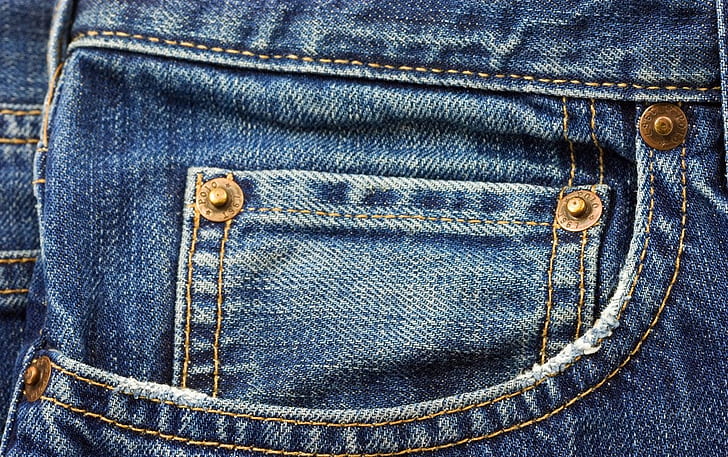 close up photo of blue denim bottoms pocket