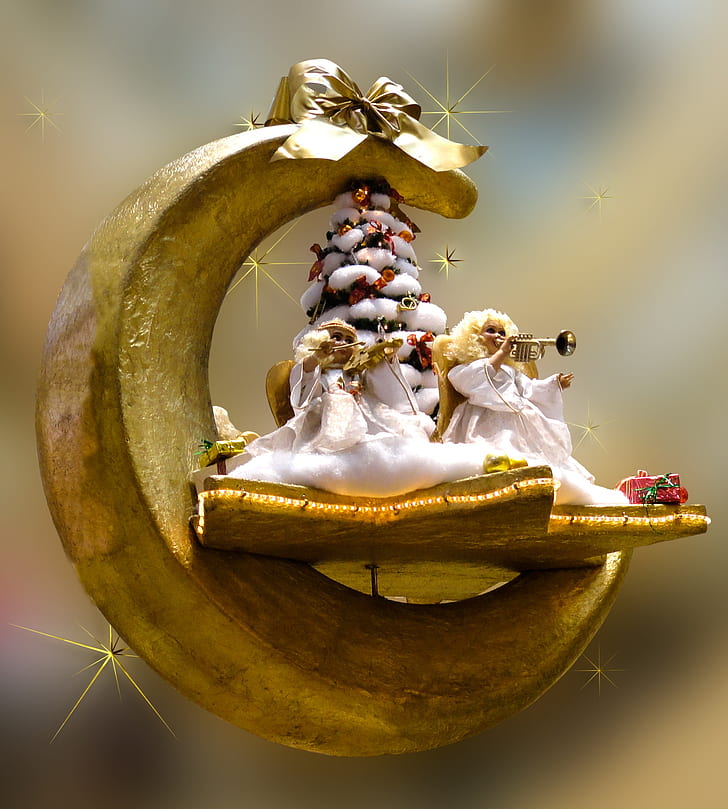 angel playing trumpet in crescent moon ornament