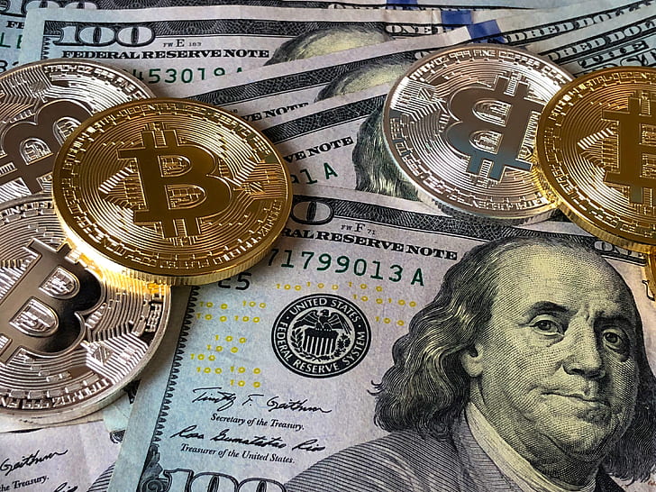 Royalty-Free photo: Bitcoins and U.s Dollar Bills - PickPik