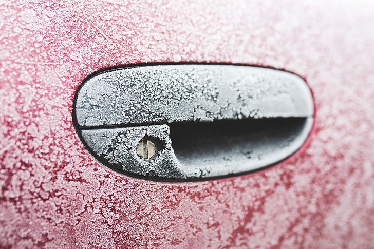 Frost on a red car