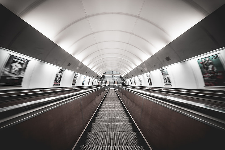 Symmetric Public Transport Network Underground Escalator
