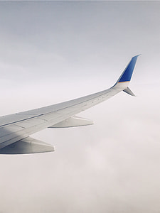photo of white airplane