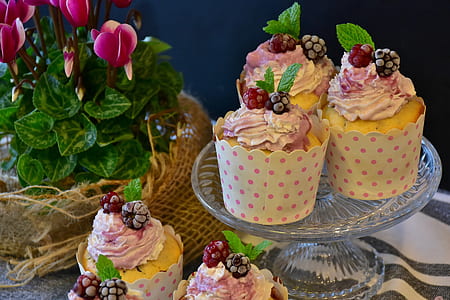 cupcakes with berry on top