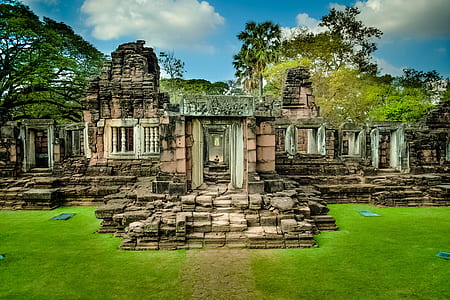 architectural photography of brown stone temple