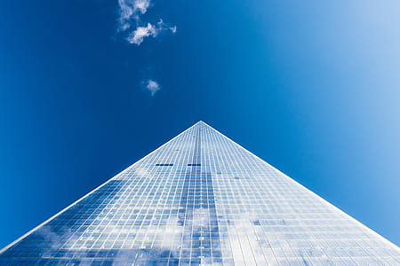 glass building under clear blue sky during daytime