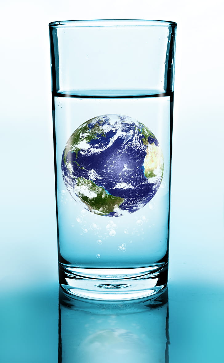 clear drinking glass with globe inside illustration
