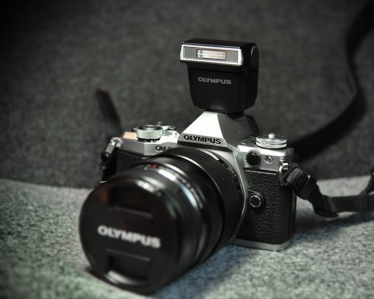 grayscale photo of Olympus camera