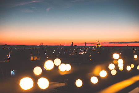 Sunset Cityscape with Bokeh Lights