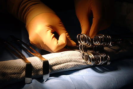 close-up photo of surgeon doing operation