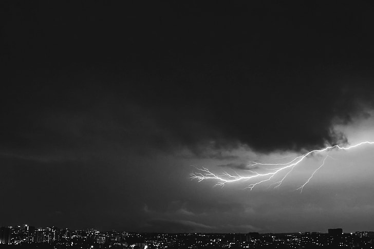 grayscale photography lightning strike