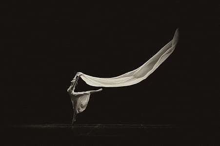 ballerina holding white textile