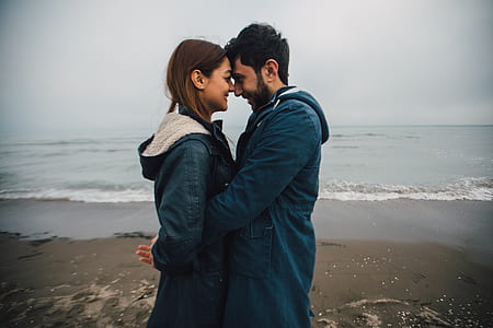 woman and man kissing each other photo