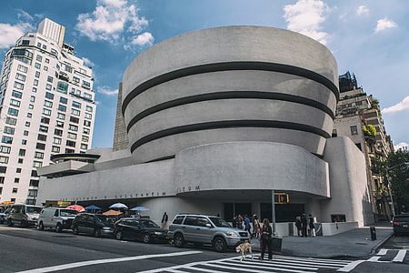 Wide angle street shot of the exterior of the Guggenheim Museum in Manhattan, New York City