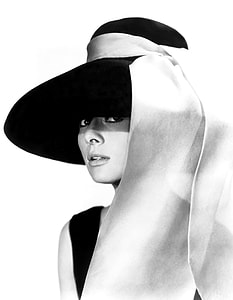 grayscale photo of woman wearing hat