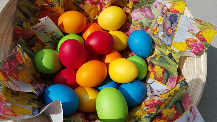 assorted-color Easter egg lot on basket