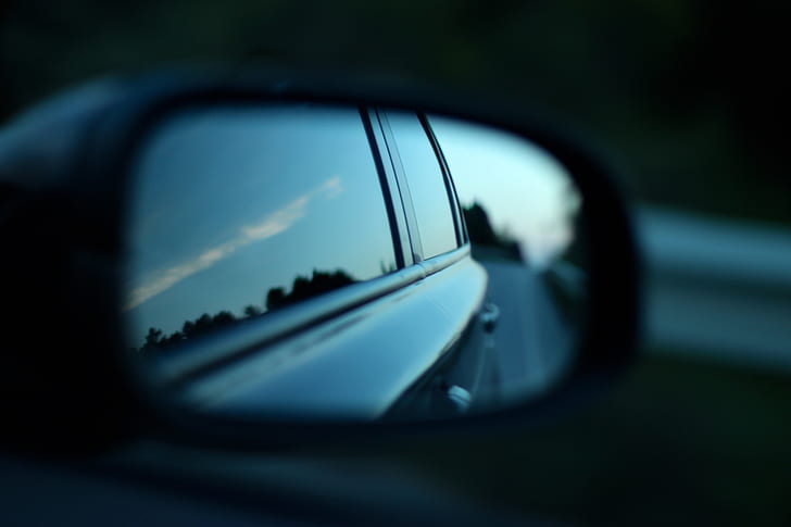 tilt shift view of car side mirror