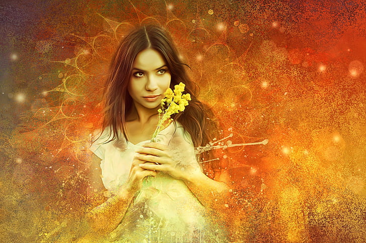 woman holding yellow petaled flower