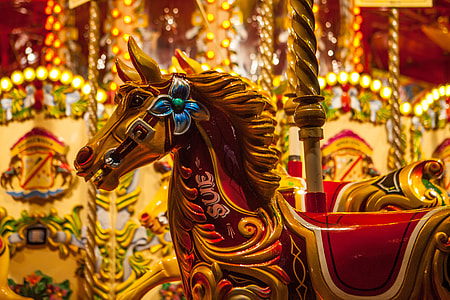 Brightly coloured fairground carousel horse