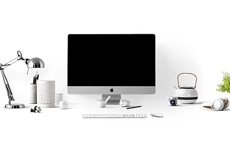 Apple desktop computer setup with white background