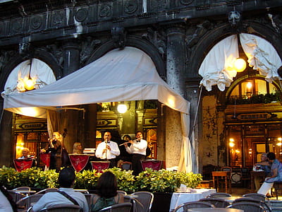 band playing instruments in restaurant