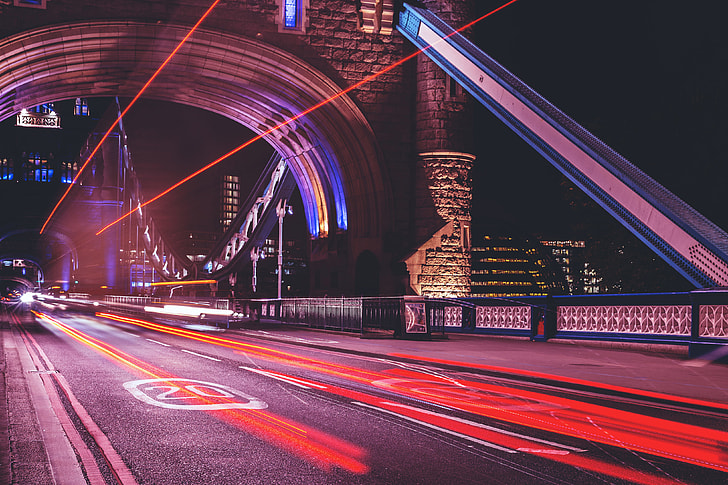 Traffic and car light trails on Tower Bridge in London