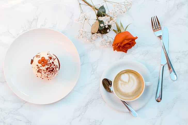 flat lay photography of cappuccino and round cake