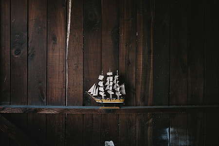 brown and white galleon ship miniature