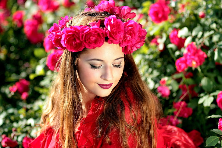 woman wearing pink rose headdress and red top