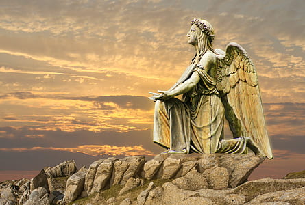 angel statue during golden hour