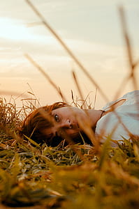Woman Laying on the Grass
