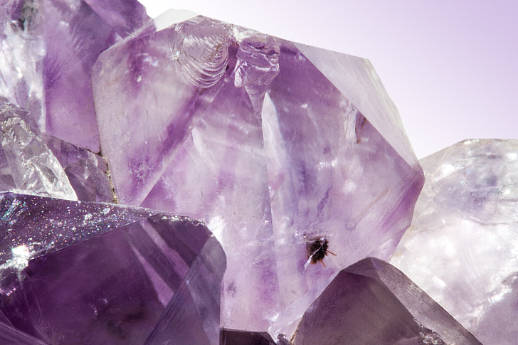 purple gemstone in macro shot