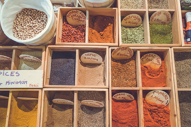 photo of assorted-color powders spices