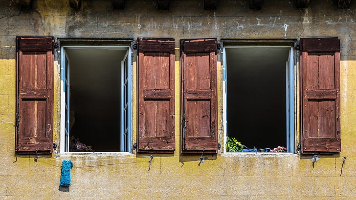 two brown wooden French-window doors