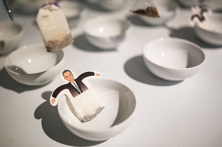 Funny tea bags and little white cups