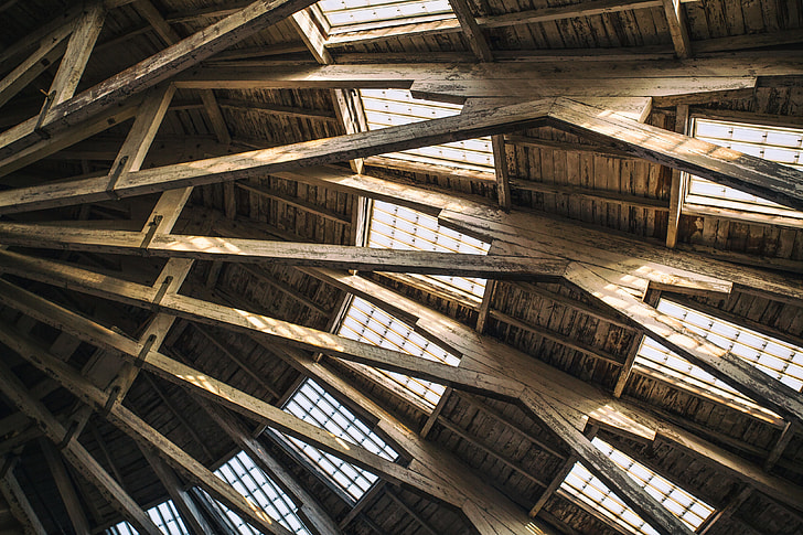 Architectural details from the roof of a wooden building at Chatham Historic Dockyard in Kent, England