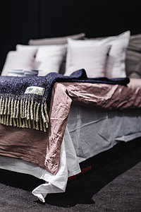 Beds with pillows on a designer exhibition