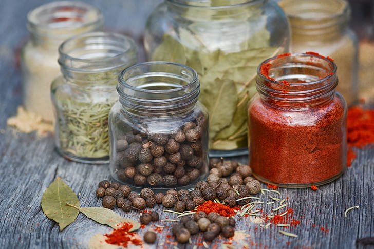 clear glass jars with spice