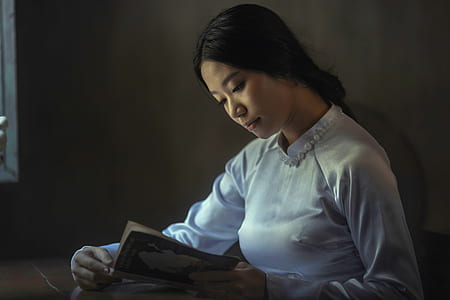 woman sitting reading book realistic painting