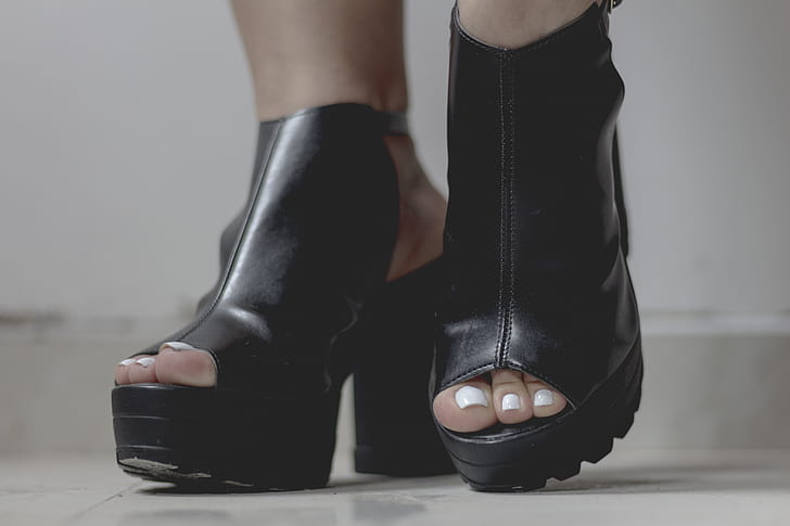 Person Wearing Black Platform Chunky Heels