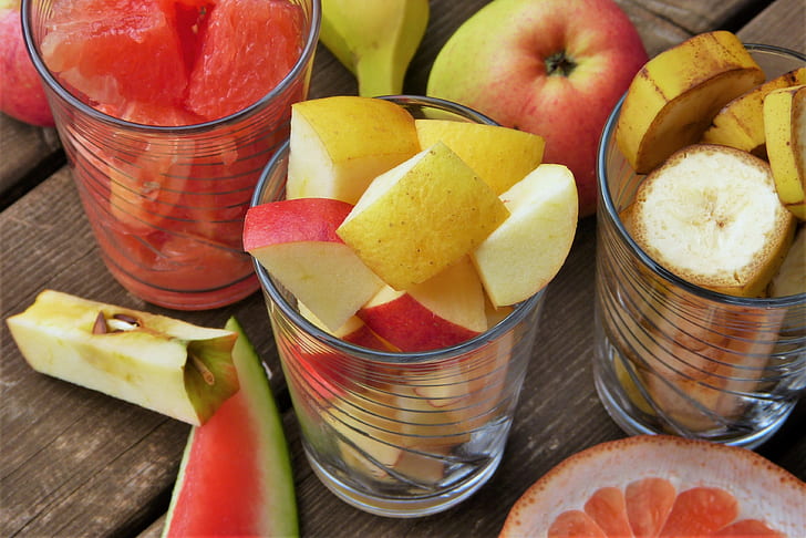 assorted fruits on glass cup