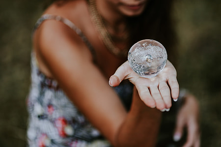Woman with a little crystal ball