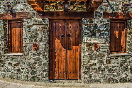 photo of closed brown wooden door