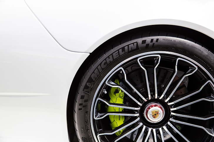 Closeup shot of the alloy wheel of a Porsche racing sports car