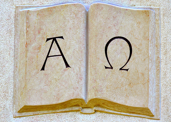 Alpha and Omega written book pages
