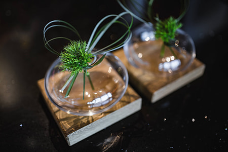 Little grass bundle with a ribbon in a glass jar