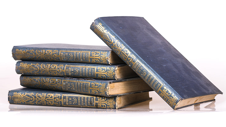 five blue hardbound books