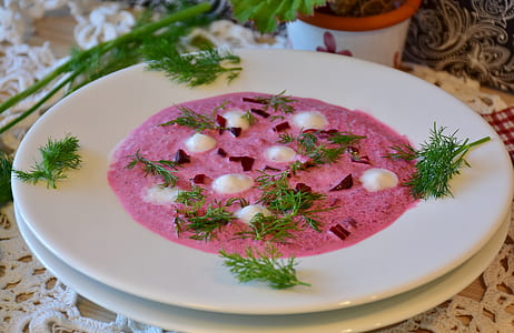 strawberry soup with white ceramic plate